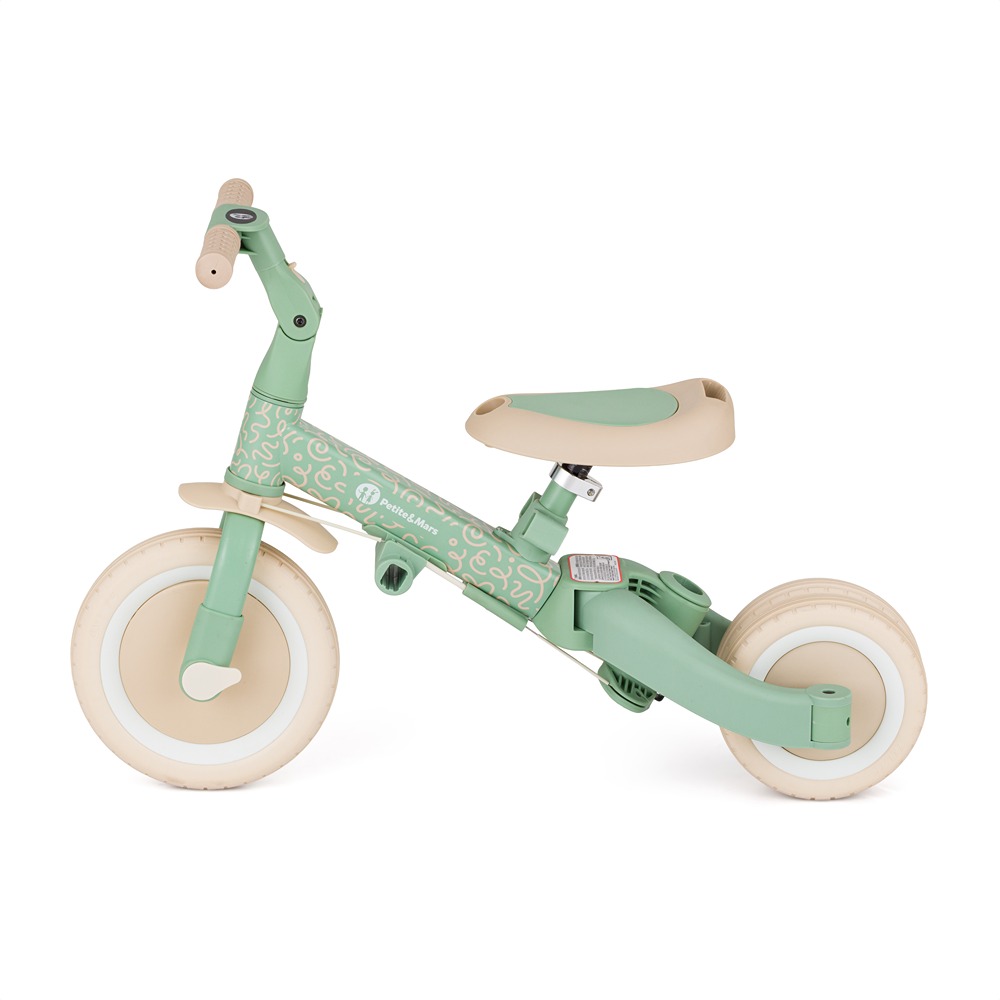 Rowerek Petite&Mars Turbo Green Twist w trybie biegowym