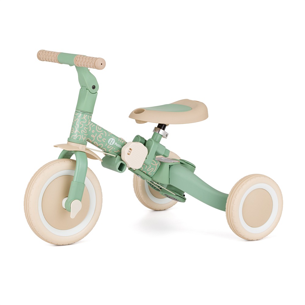 Rowerek Petite&Mars Turbo Green Twist widziany z boku