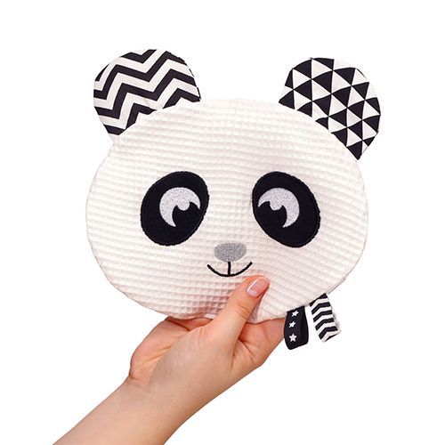 Dziecko bawiące się przytulanką Babyono Happy Panda